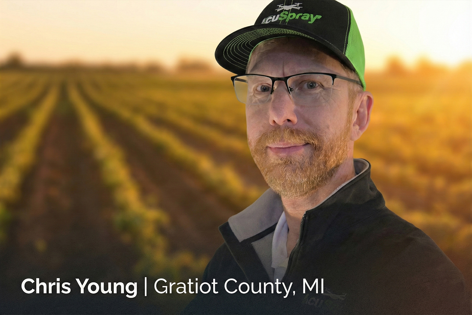 Chris Young, AcuSpray drone operator for Gratiot County, MI, wearing branded AcuSpray gear against a sunset agricultural field background.